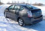 Автомобиль Toyota Prius - хэтчбек фото