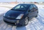 Автомобиль Toyota Prius - хэтчбек фото