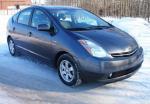 Автомобиль Toyota Prius - хэтчбек фото