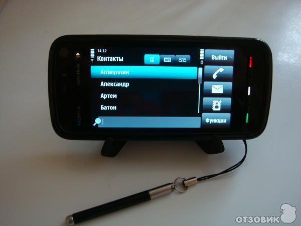 Nokia XpressMusic 5800 - сотовый телефон фото